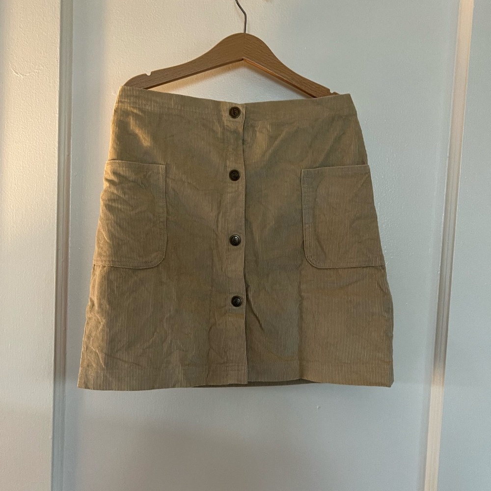Snap front Little English corduroy skirt, size 12.